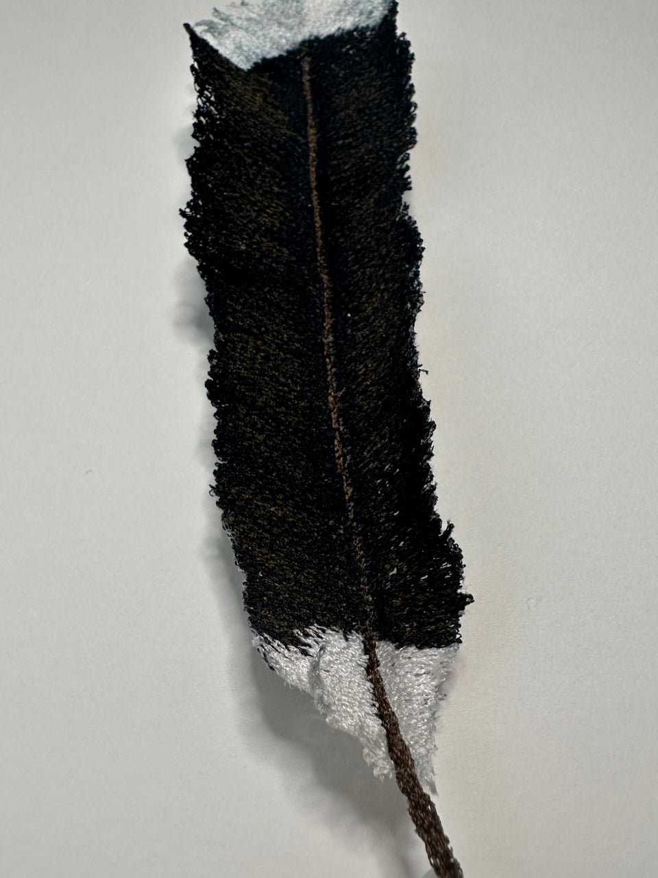 Huia feather sculptural embroidery