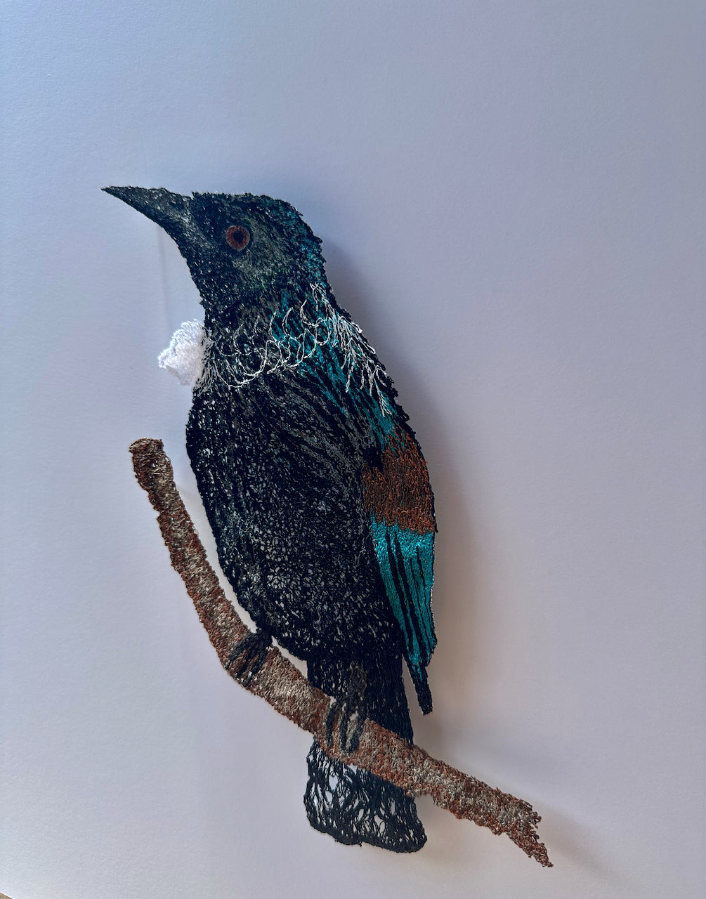 Tui sculptural embroidery.