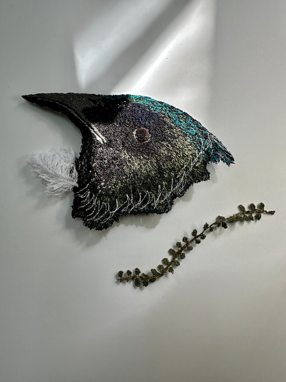 Tui and Kowhai leaf sculptural embroidery