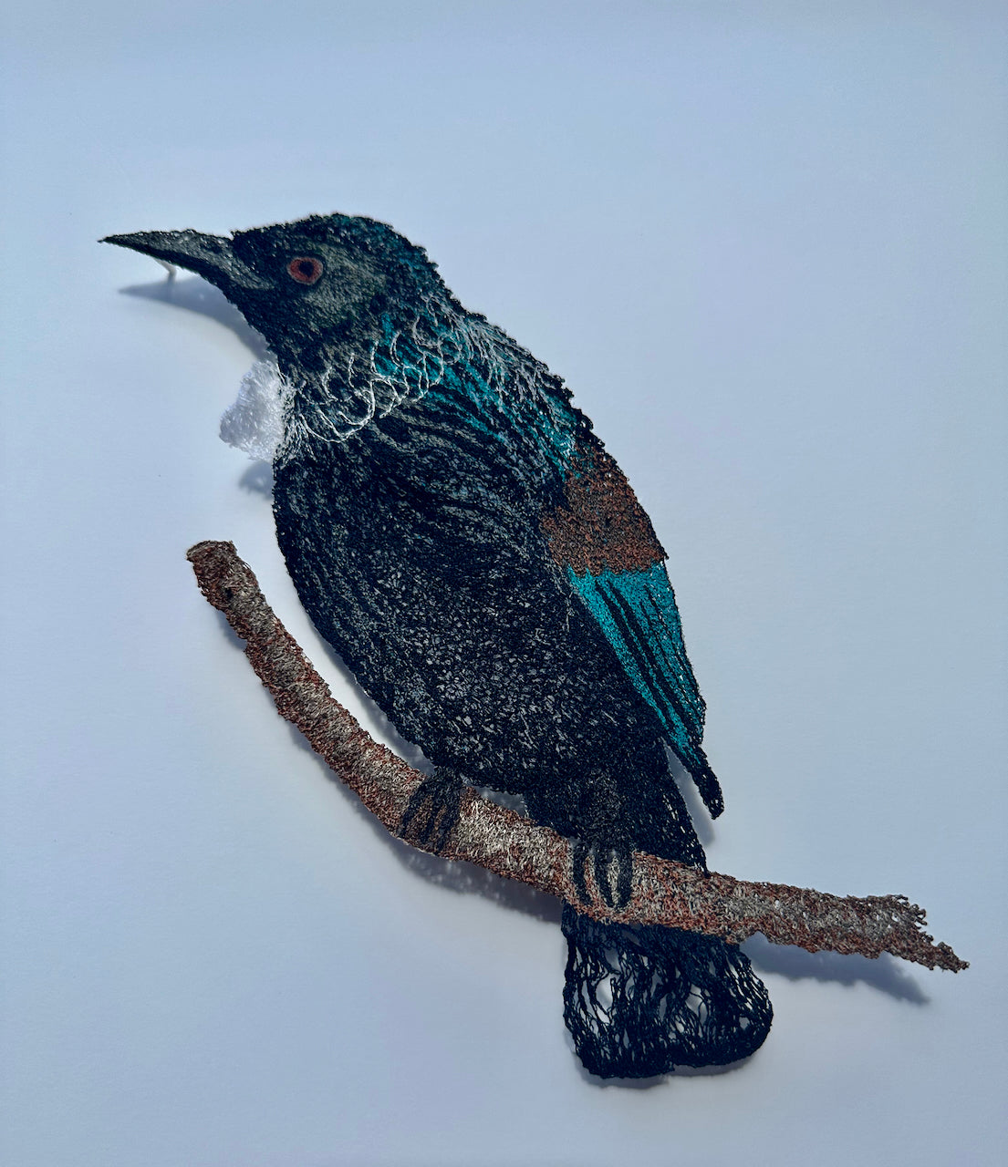 Tui sculptural embroidery.